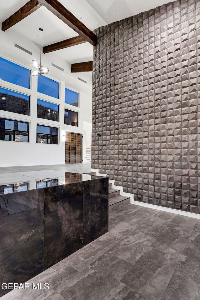 4108 Metetuye Ln, El Paso, TX 79902 - interior space with a towering ceiling and beamed ceiling