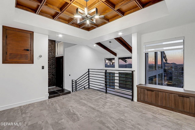 4108 Metetuye Ln, El Paso, TX 79902 - unfurnished room with beamed ceiling, wood ceiling, coffered ceiling, a notable chandelier, and baseboards