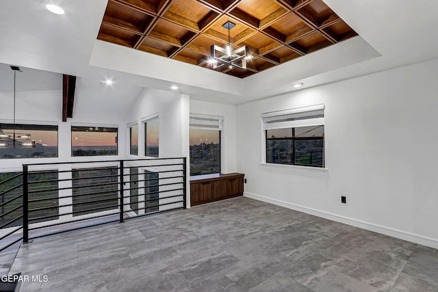 4108 Metetuye Ln, El Paso, TX 79902 - unfurnished room featuring baseboards, coffered ceiling, a notable chandelier, and wood ceiling