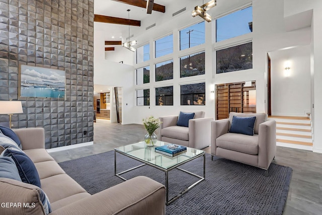 4108 Metetuye Ln, El Paso, TX 79902 - living room with beamed ceiling, an inviting chandelier, a towering ceiling, wood finished floors, and baseboards