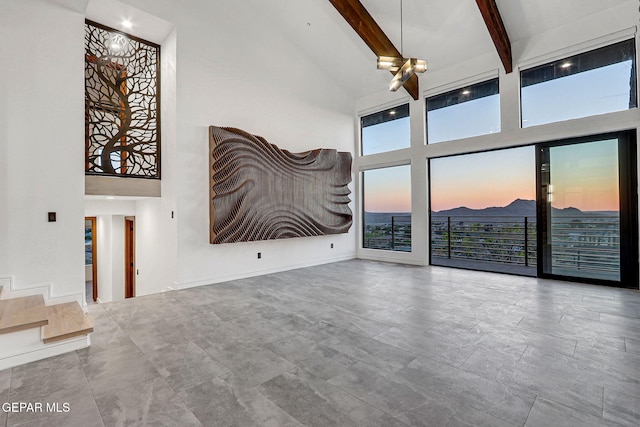 4108 Metetuye Ln, El Paso, TX 79902 - unfurnished living room featuring high vaulted ceiling and beamed ceiling