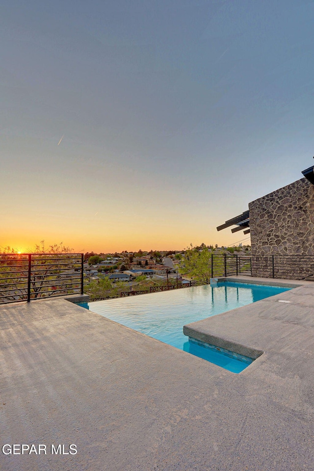 4108 Metetuye Ln, El Paso, TX 79902 - view of pool with a patio area and an infinity pool