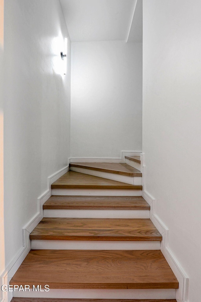 4108 Metetuye Ln, El Paso, TX 79902 - stairs with wood finished floors