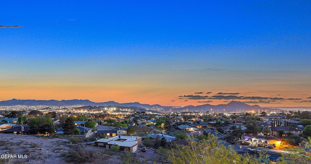 4108 Metetuye Ln, El Paso, TX 79902 - aerial view at dusk with a mountain view and a residential view