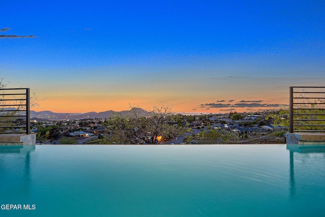 4108 Metetuye Ln, El Paso, TX 79902 - view of swimming pool with a mountain view