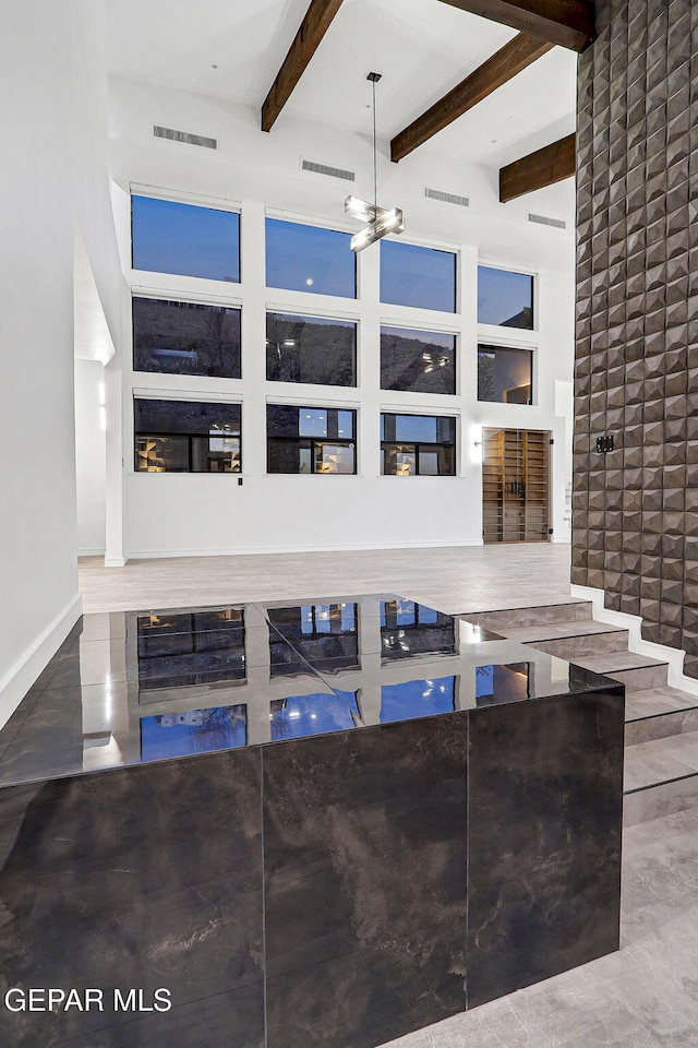 4108 Metetuye Ln, El Paso, TX 79902 - interior space featuring visible vents, baseboards, and beamed ceiling