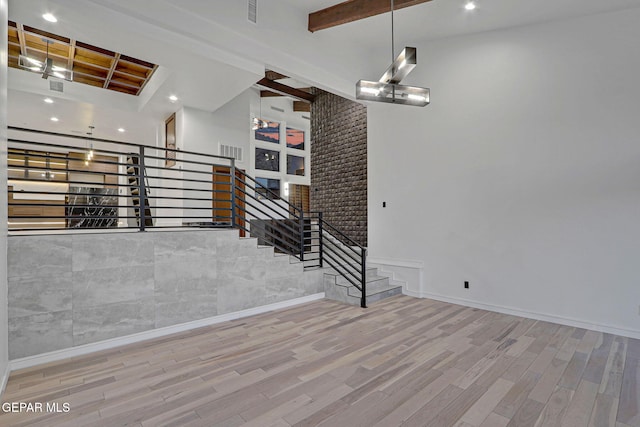 4108 Metetuye Ln, El Paso, TX 79902 - interior space featuring wood finished floors, stairs, visible vents, and recessed lighting