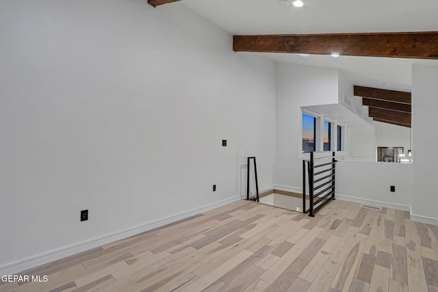 4108 Metetuye Ln, El Paso, TX 79902 - spare room with recessed lighting, light wood-style flooring, baseboards, and vaulted ceiling with beams