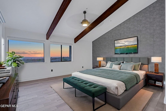 4108 Metetuye Ln, El Paso, TX 79902 - bedroom featuring light wood-style flooring, baseboards, beam ceiling, and an accent wall