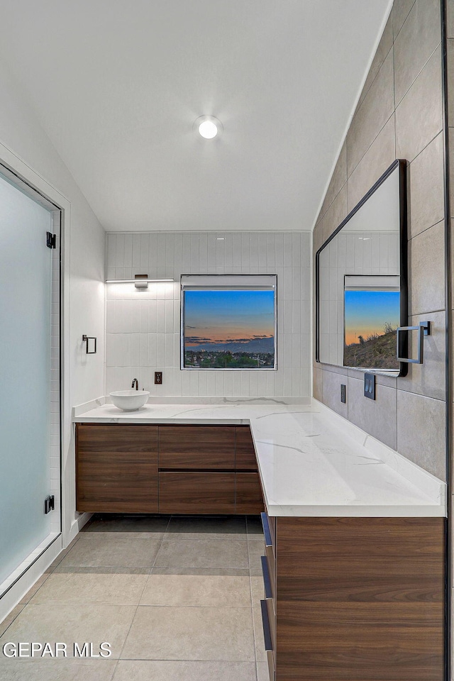4108 Metetuye Ln, El Paso, TX 79902 - bathroom featuring tasteful backsplash, vanity, and tile patterned flooring