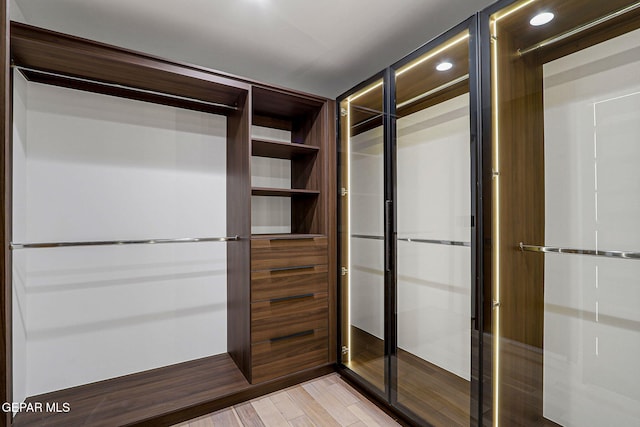 4108 Metetuye Ln, El Paso, TX 79902 - walk in closet featuring light wood-type flooring
