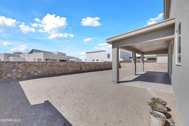 view of yard featuring a patio and a fenced backyard