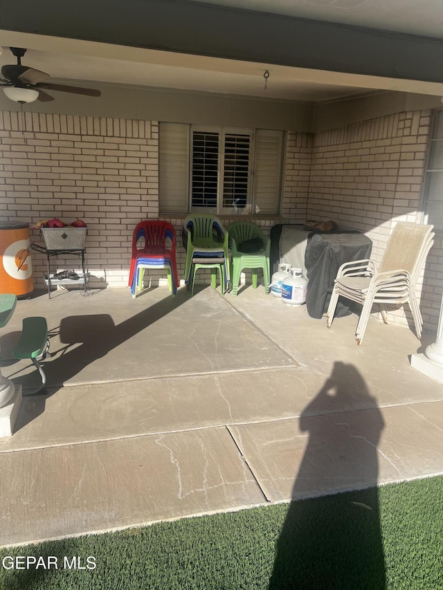 view of patio / terrace with a ceiling fan