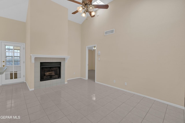 7341 Desierto Rojo Ct, El Paso, TX 79912 - unfurnished living room featuring tile patterned floors, visible vents, baseboards, high vaulted ceiling, and ceiling fan