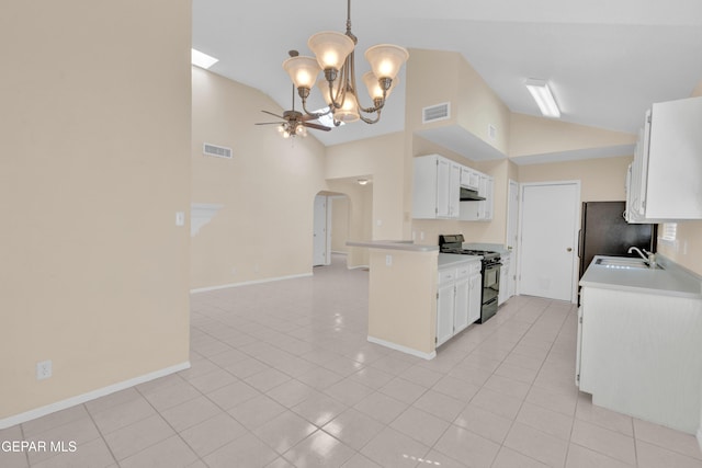 7341 Desierto Rojo Ct, El Paso, TX 79912 - kitchen with black appliances, arched walkways, visible vents, and ceiling fan with notable chandelier