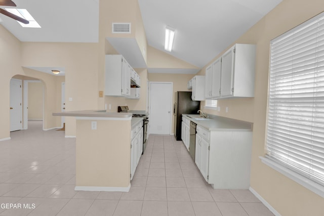 7341 Desierto Rojo Ct, El Paso, TX 79912 - kitchen with light tile patterned floors, appliances with stainless steel finishes, light countertops, white cabinetry, and visible vents