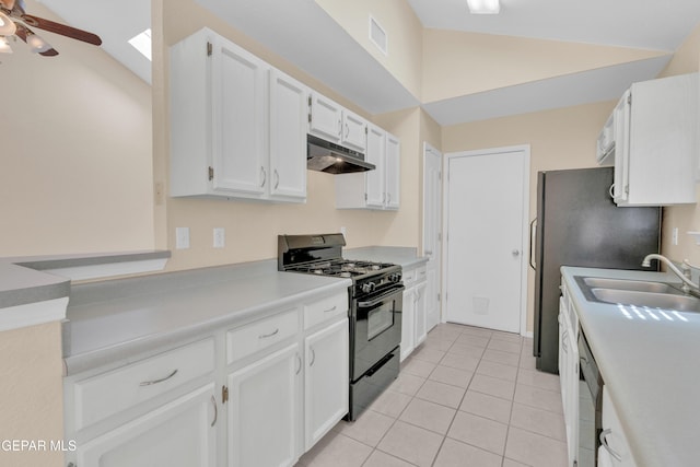 7341 Desierto Rojo Ct, El Paso, TX 79912 - kitchen featuring lofted ceiling with skylight, a sink, a ceiling fan, black range with gas cooktop, and under cabinet range hood