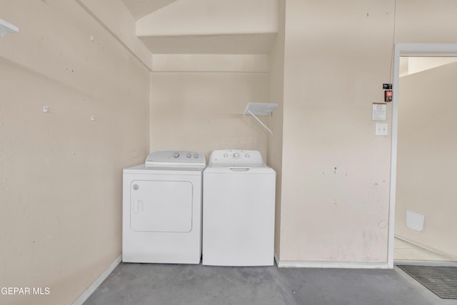 7341 Desierto Rojo Ct, El Paso, TX 79912 - washroom featuring washer and dryer, baseboards, and laundry area