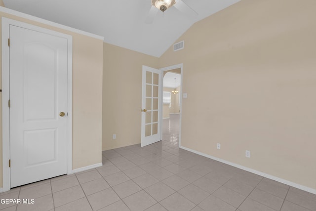 7341 Desierto Rojo Ct, El Paso, TX 79912 - spare room featuring vaulted ceiling, a ceiling fan, light tile patterned flooring, baseboards, and visible vents