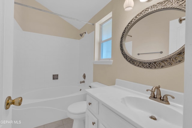 7341 Desierto Rojo Ct, El Paso, TX 79912 - full bathroom with lofted ceiling, tile patterned flooring, shower / washtub combination, toilet, and vanity