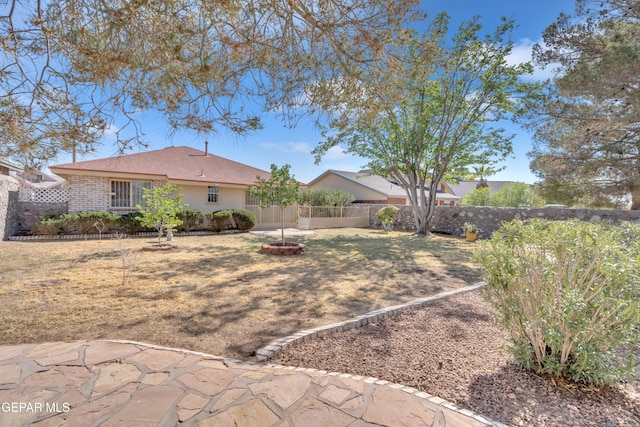 7341 Desierto Rojo Ct, El Paso, TX 79912 - view of yard with a fenced backyard