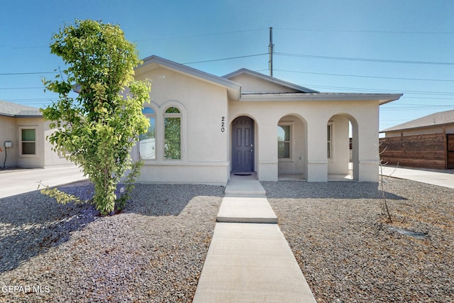 view of front of home featuring stucco siding