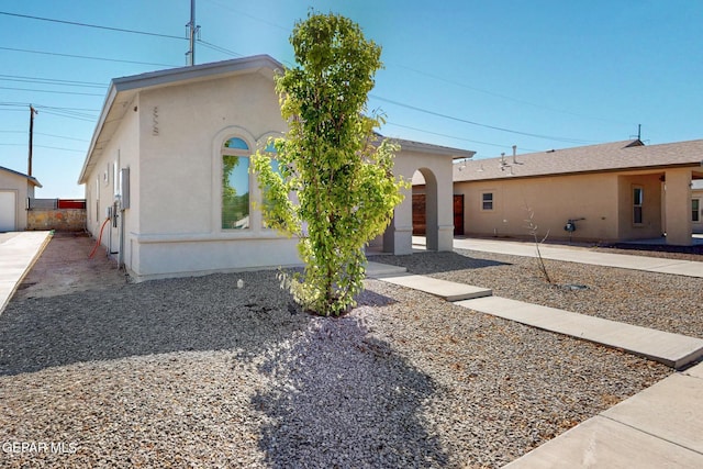 view of front of home with stucco siding
