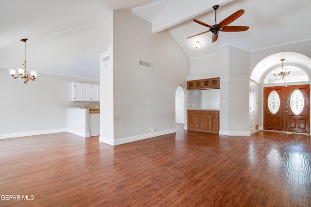unfurnished living room featuring visible vents, arched walkways, beam ceiling, ceiling fan with notable chandelier, and high vaulted ceiling