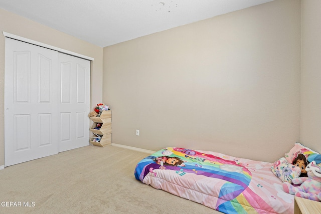 11656 Ochre Bluff Ln, El Paso, TX 79934 - carpeted bedroom with a closet and baseboards
