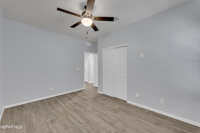 14825 Harry Flournoy Ave, El Paso, TX 79938 - unfurnished bedroom featuring a closet, visible vents, baseboards, and wood finished floors