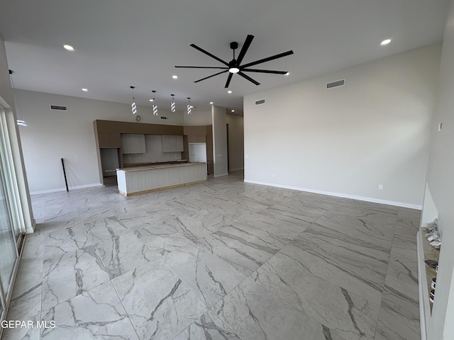 11345 Ardelle Ave, El Paso, TX 79936 - unfurnished living room with a ceiling fan, visible vents, recessed lighting, marble finish floor, and baseboards