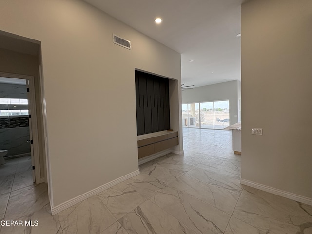 11345 Ardelle Ave, El Paso, TX 79936 - hall with marble finish floor, baseboards, visible vents, and recessed lighting