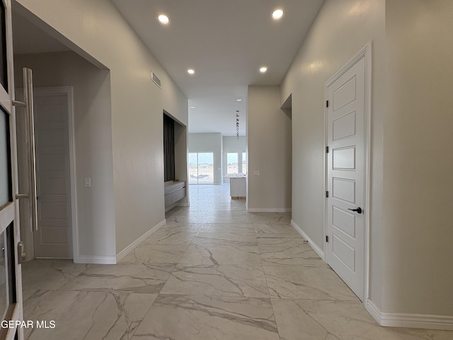 11345 Ardelle Ave, El Paso, TX 79936 - hallway with visible vents, baseboards, recessed lighting, and marble finish floor