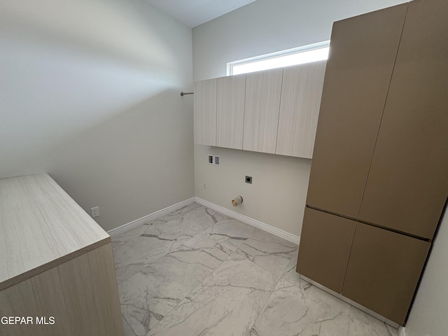 11345 Ardelle Ave, El Paso, TX 79936 - washroom with hookup for a washing machine, electric dryer hookup, marble finish floor, baseboards, and cabinet space