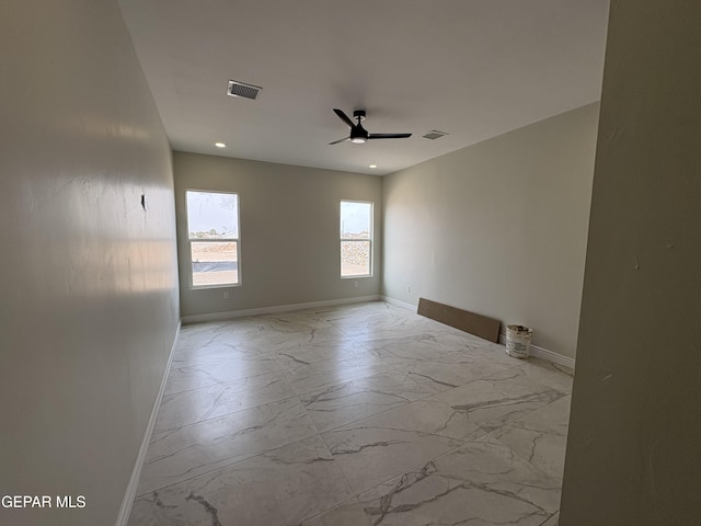 11345 Ardelle Ave, El Paso, TX 79936 - empty room featuring ceiling fan, baseboards, and visible vents