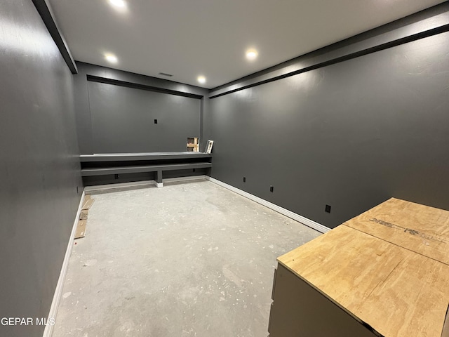 11345 Ardelle Ave, El Paso, TX 79936 - home theater featuring concrete floors and baseboards