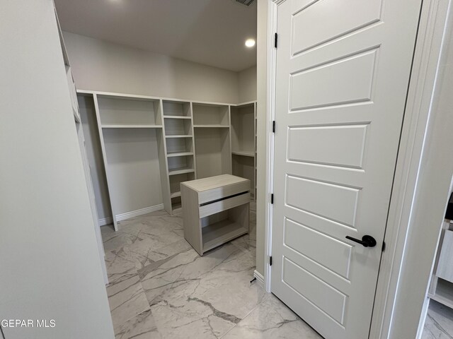11345 Ardelle Ave, El Paso, TX 79936 - spacious closet with marble finish floor