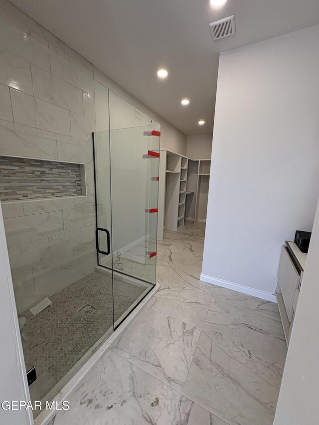 11345 Ardelle Ave, El Paso, TX 79936 - full bath with a shower stall, visible vents, recessed lighting, marble finish floor, and baseboards