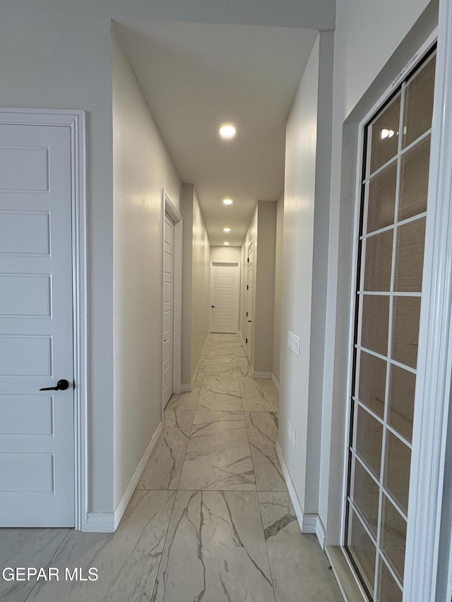11345 Ardelle Ave, El Paso, TX 79936 - corridor featuring marble finish floor, baseboards, and recessed lighting