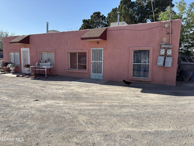 8154 Holloway Pl, El Paso, TX 79907 - back of house featuring stucco siding