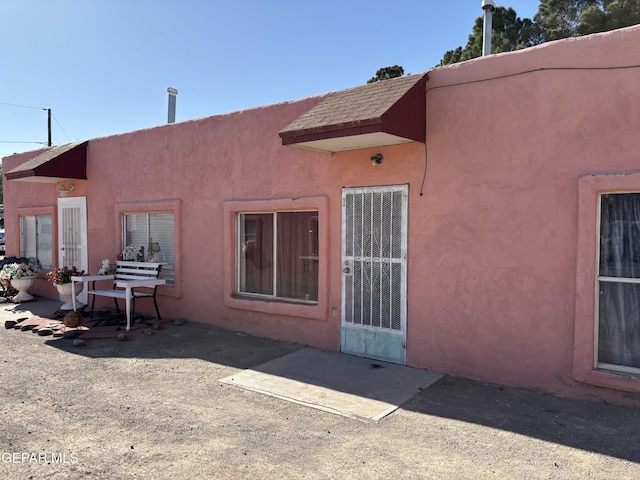 8154 Holloway Pl, El Paso, TX 79907 - rear view of property with stucco siding