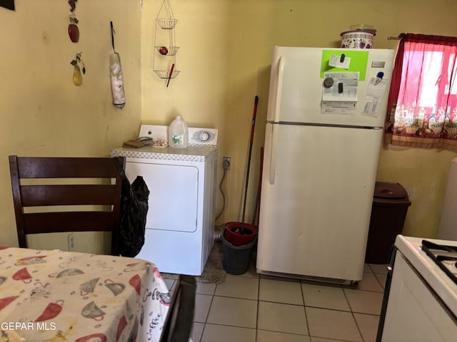 8154 Holloway Pl, El Paso, TX 79907 - interior space with light tile patterned floors and washer / dryer