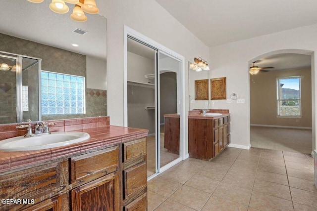 7350 La Casa Way, Canutillo, TX 79835 - bathroom with visible vents, a sink, a stall shower, and tile patterned flooring