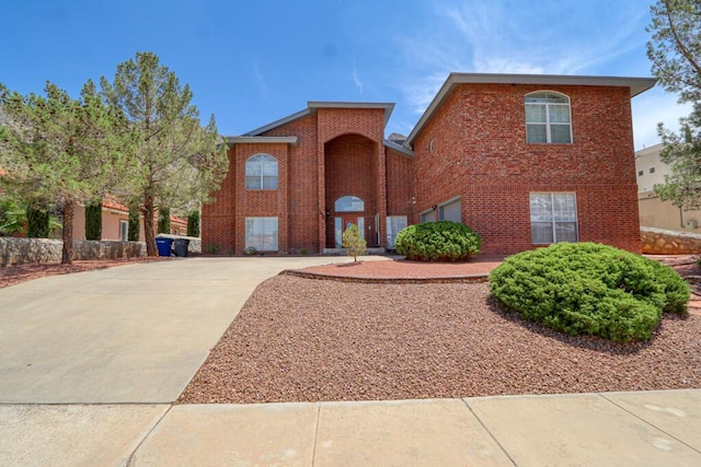 5628 Buckley Dr, El Paso, TX 79912 - traditional-style house with brick siding, a garage, and driveway