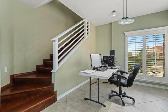 5628 Buckley Dr, El Paso, TX 79912 - tiled office space featuring baseboards