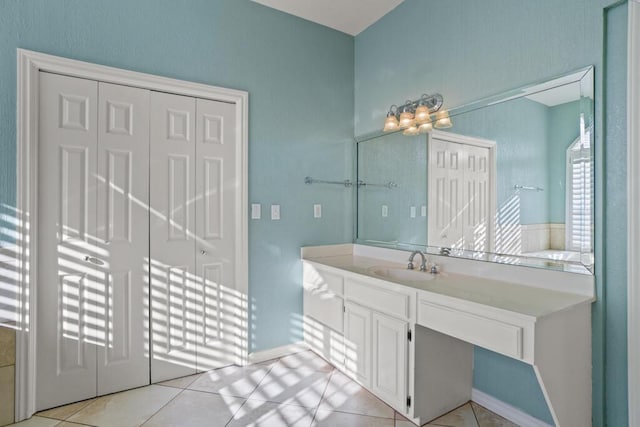 5628 Buckley Dr, El Paso, TX 79912 - bathroom with tile patterned floors and vanity