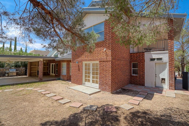 5628 Buckley Dr, El Paso, TX 79912 - rear view of property with brick siding