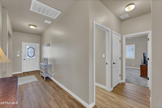3841 Loma Adriana, El Paso, TX 79938 - foyer with light wood-style flooring, baseboards, and a textured wall