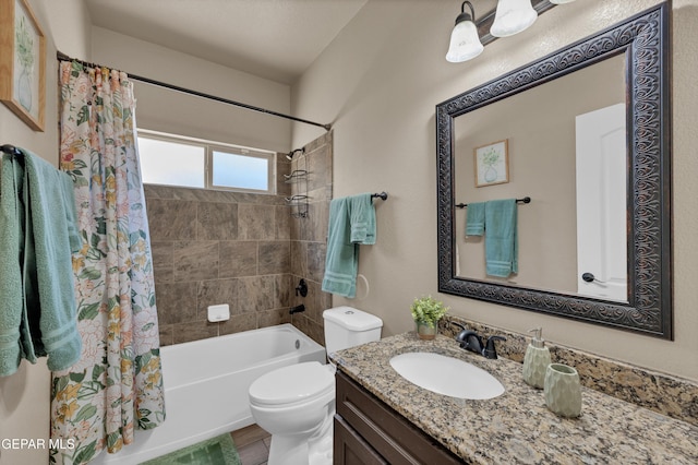 3841 Loma Adriana, El Paso, TX 79938 - full bathroom featuring shower / bath combo with shower curtain, vanity, and toilet