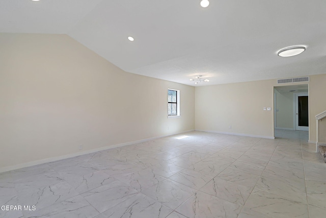 unfurnished room with marble finish floor, baseboards, and visible vents